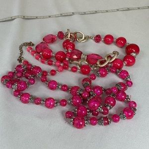 Two hot pink statement necklaces